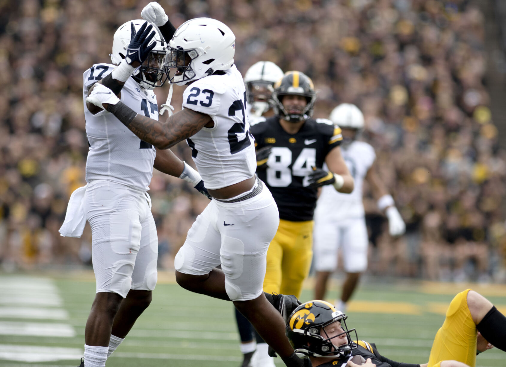Penn State football vs. Iowa, Jacobs (23) & Ebiketie (17)